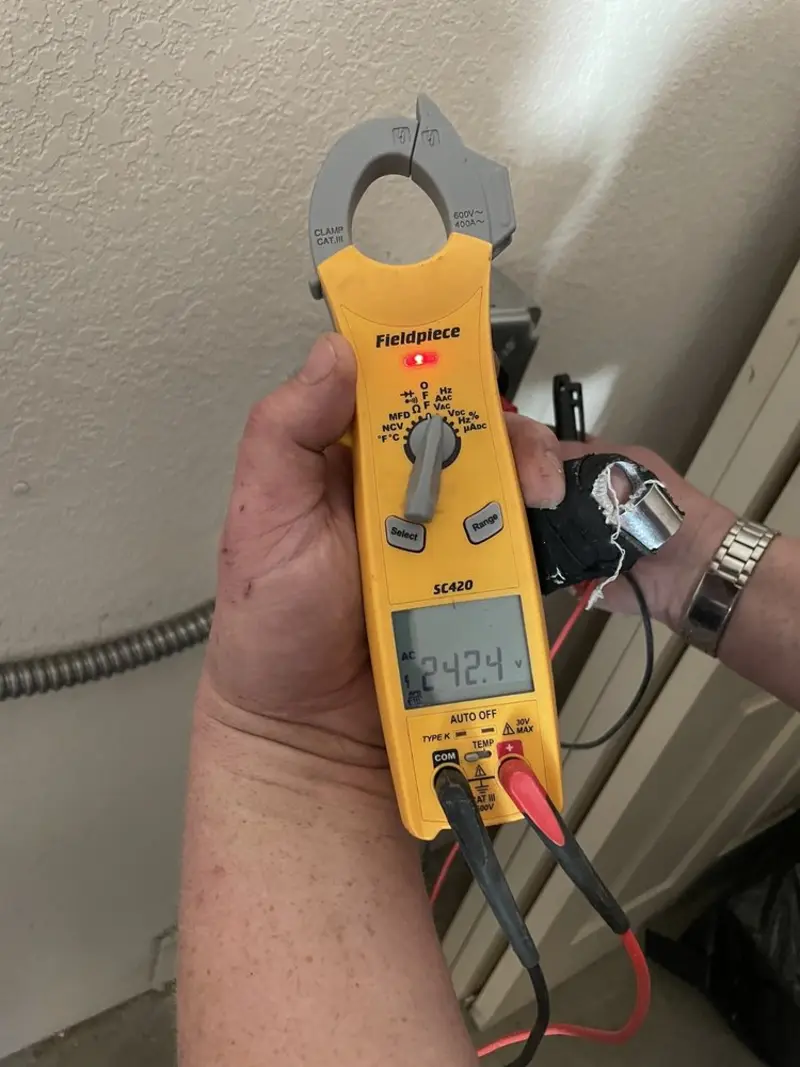Voltage testing with clamp meter during Generator Installation in Lacy-Lakeview